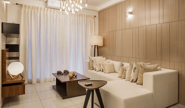 Prestige Park Street living room render showing the sofa cluster and full-height balcony glazing